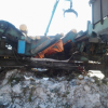 Timber crane, Log Step feeder