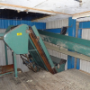 Used wood sorting line, scrap conveyor